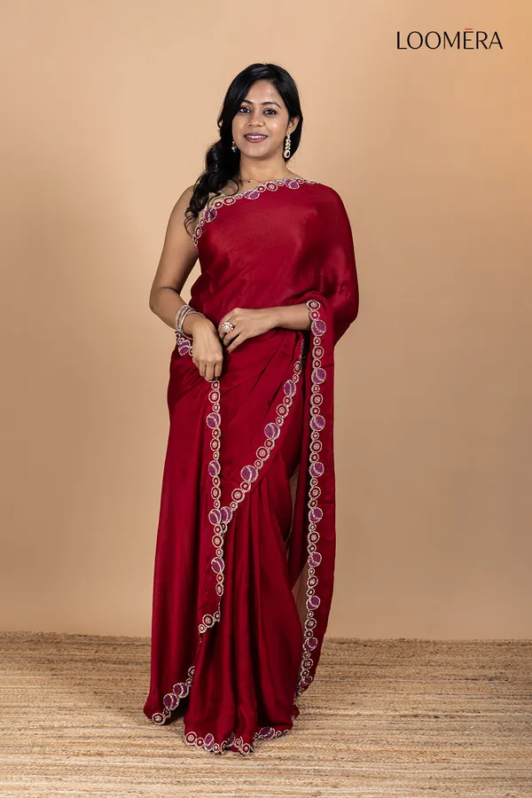 Maroon_Plain_Silk_Saree_With_Stone_Designed_Border
