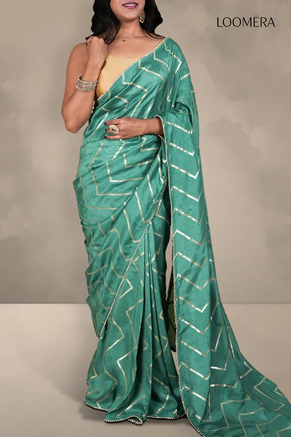 Teal_Green_Saree_With_Zigzag_Golden_Zari_Weave