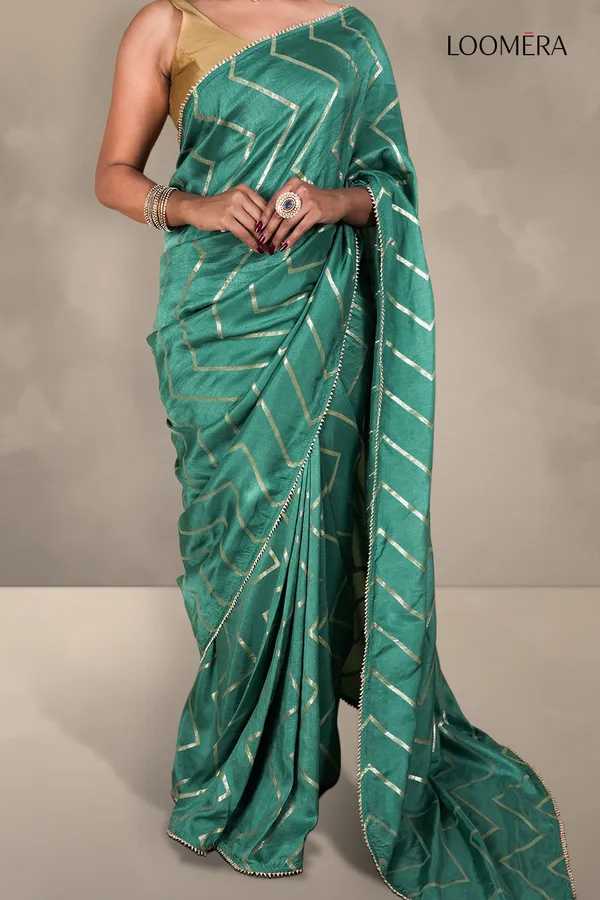 Teal_Green_Saree_With_Zigzag_Golden_Zari_Weave