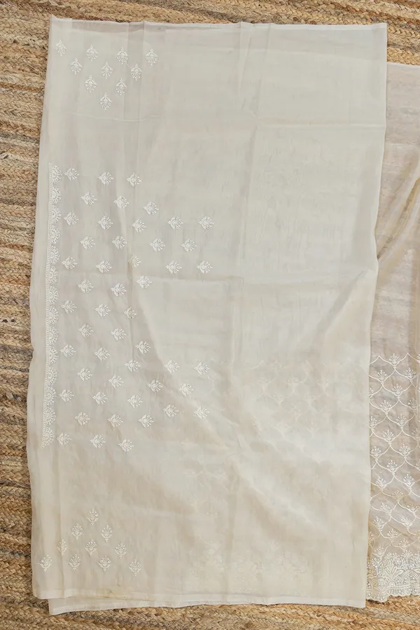 Off_White_Organza_Saree_With_Heavy_Thread_And_Stone_Embellishments