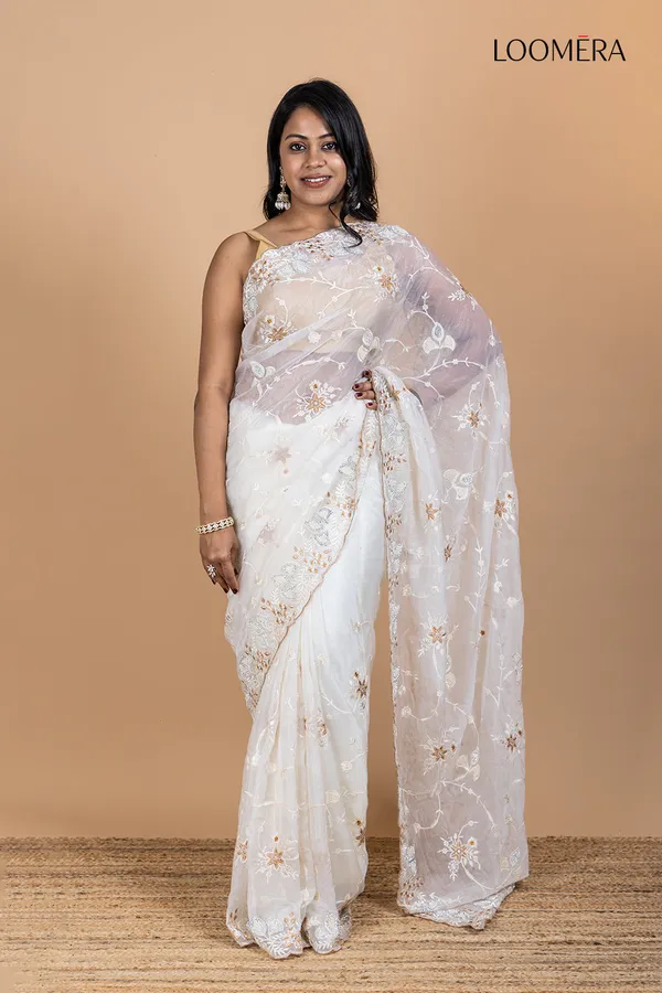 White_Organza_Saree_With_Heavy_Thread_Work_And_Stone_Embellishments