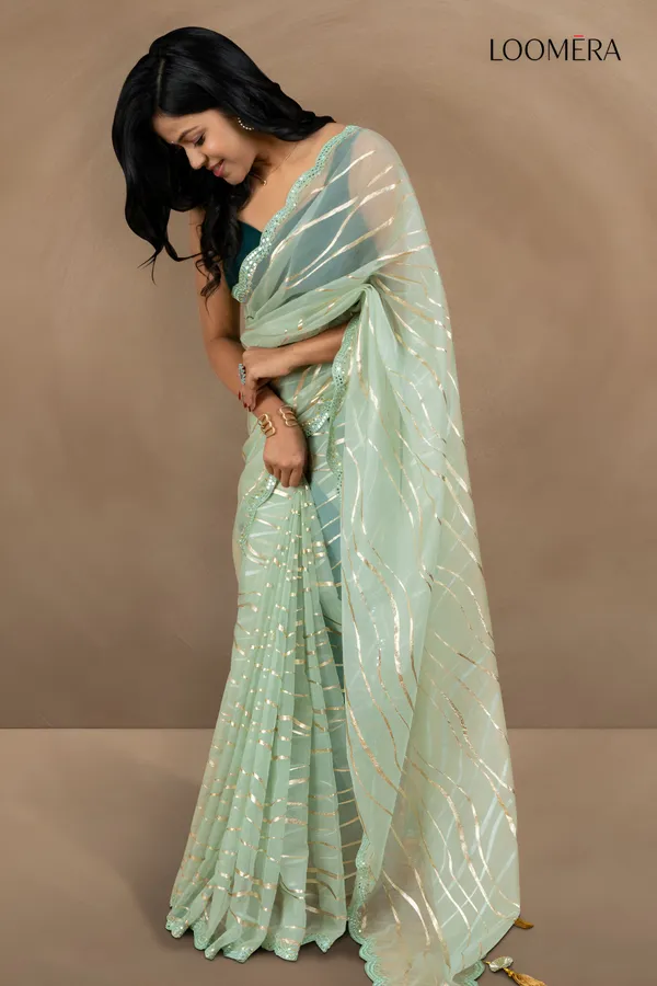 Pastel_Green_Organza_Saree_With_Mirror_Scallop_Border