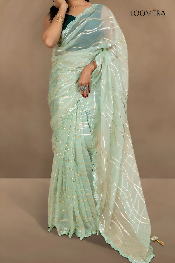 Pastel_Green_Organza_Saree_With_Mirror_Scallop_Border