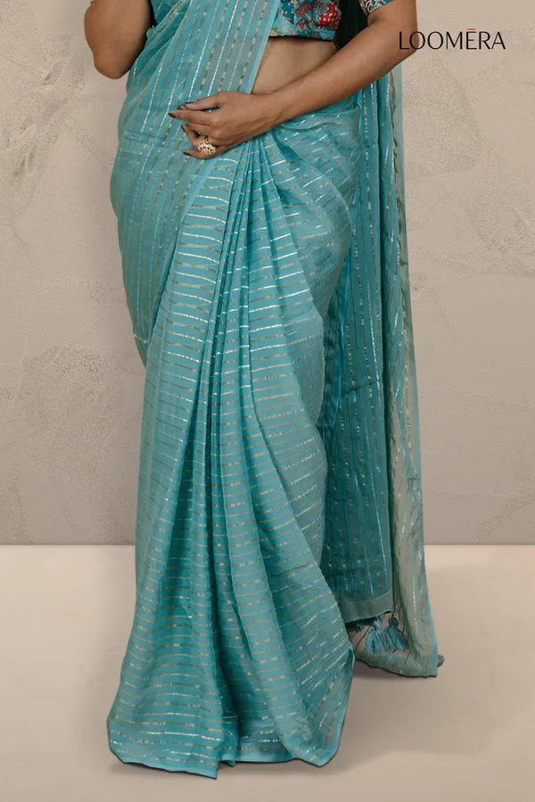 Cyan_Saree_With_Elegant_Zari_Lines_And_Readymade_Blouse