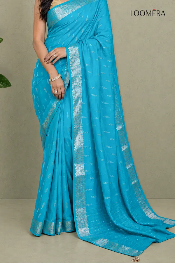 Cyan_Blue_Semi_Silk_Saree_With_Silver_Butta_And_Zari_Border