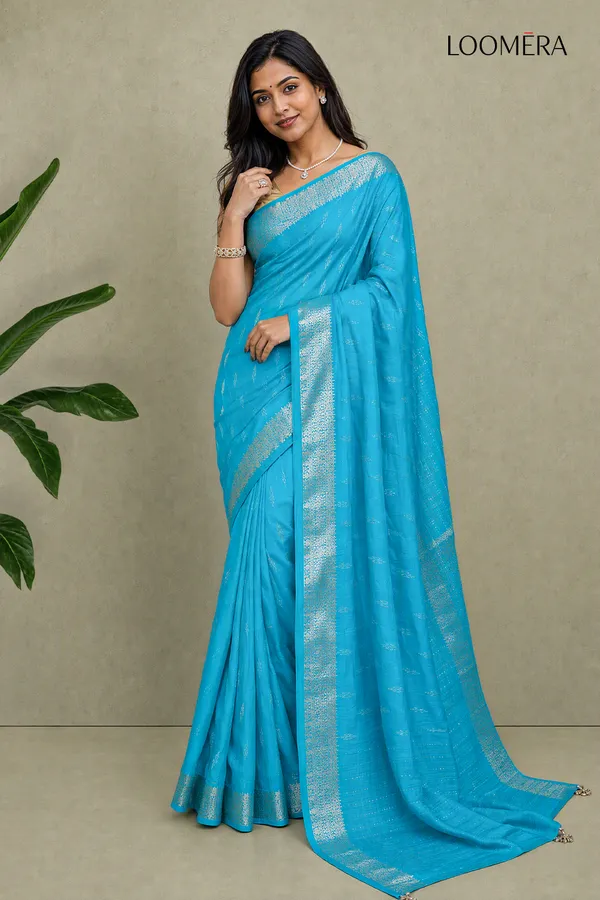 Cyan_Blue_Semi_Silk_Saree_With_Silver_Butta_And_Zari_Border