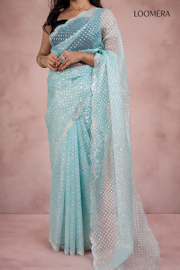Pastel_Blue_Organza_Saree_With_Mirror_Scallop_Border