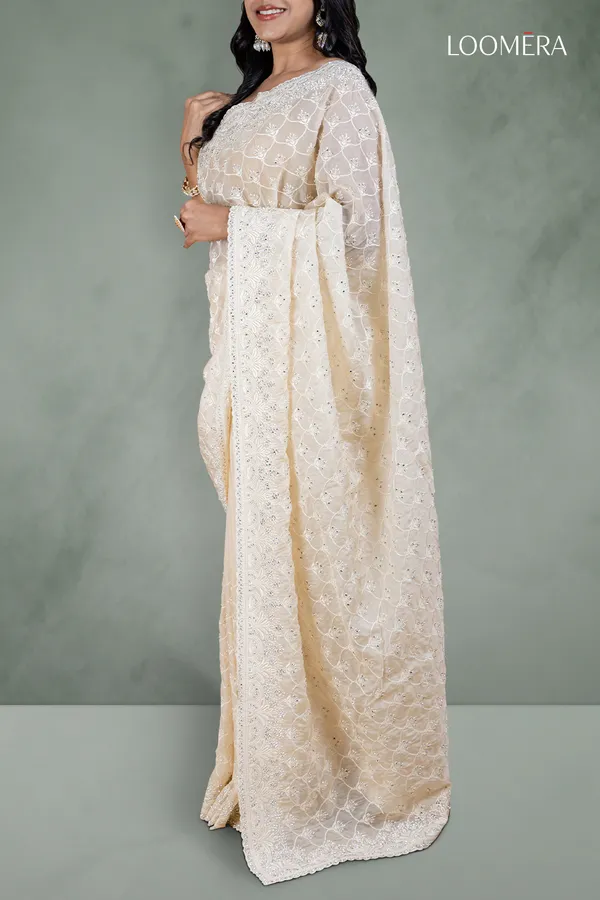Off_White_Organza_Saree_With_Heavy_Thread_And_Stone_Embellishments