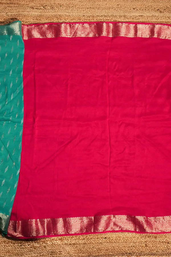 Cyan_Blue_Semi_Silk_Saree_With_Silver_Butta_And_Zari_Border
