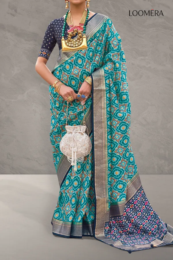 Teal_Blue_Printed_Soft_Silk_Saree_With_Zari_Border