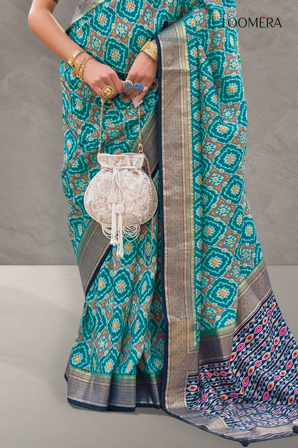 Teal_Blue_Printed_Soft_Silk_Saree_With_Zari_Border