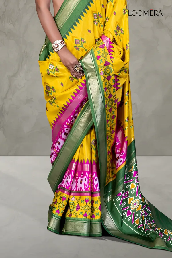 Marigold_Yellow_Patola_Saree_With_Green_Zari_Border