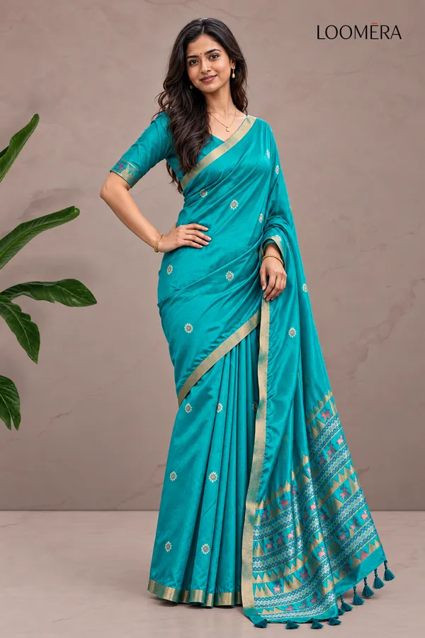 Teal_Blue_Tussar_Silk_Saree_with_Golden_Border