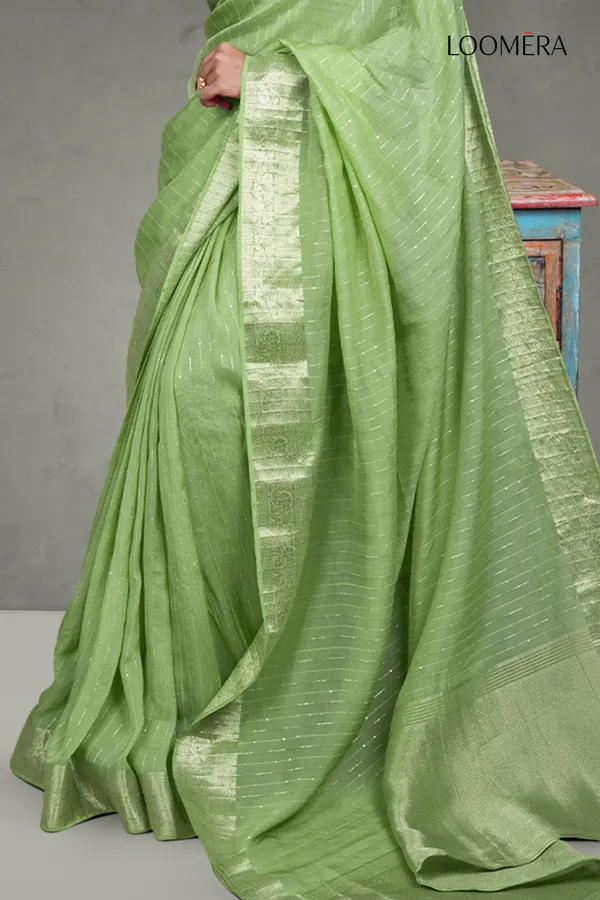 Sage_Green_Sequined_Line_Saree_With_Floral_Zari_Border