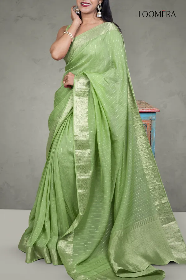 Sage_Green_Sequined_Line_Saree_With_Floral_Zari_Border