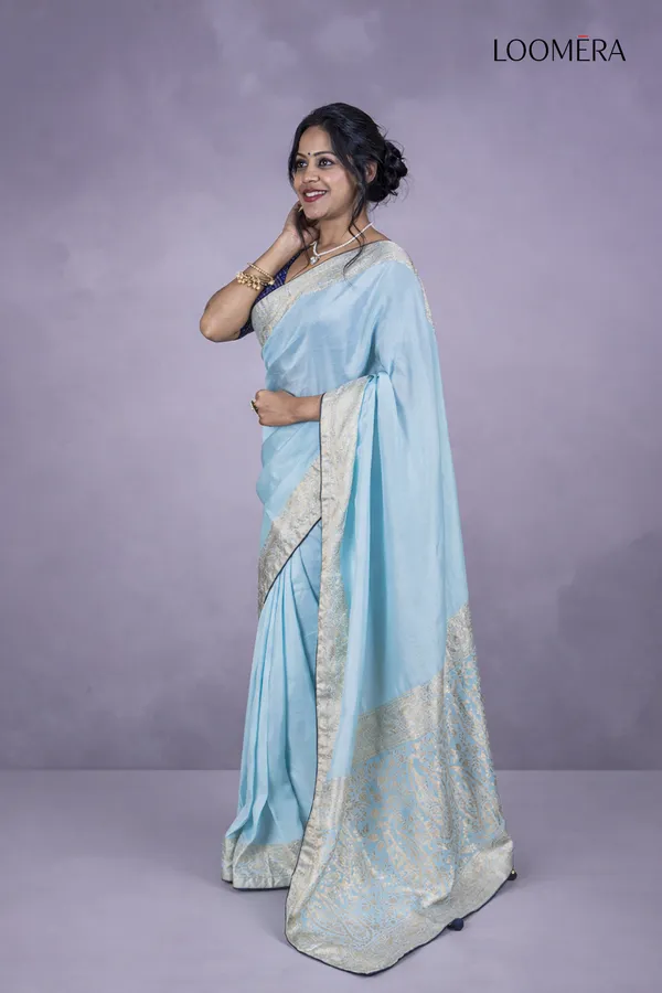 Pastel_Blue_Saree_With_Silver_Zari_Border_And_Readymade_Blouse