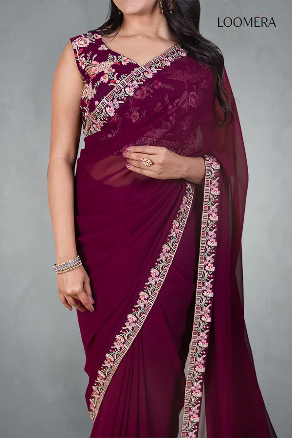 Plum_Georgette_Saree_With_Embroidered_Border_And_Designer_Blouse