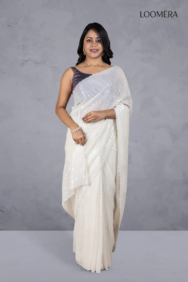 Off_White_Shimmer_Chiffon_Saree_With_Sequin_Work_And_Scallop_Border