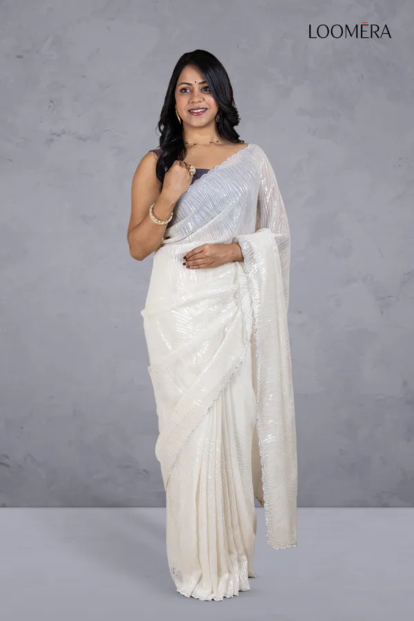 Off_White_Shimmer_Chiffon_Saree_With_Sequin_Work_And_Scallop_Border