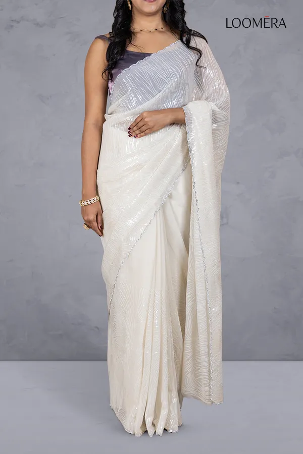 Off_White_Shimmer_Chiffon_Saree_With_Sequin_Work_And_Scallop_Border