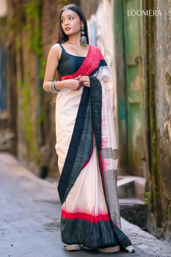 Beige_Saree_with_Red_and_Black_Border
