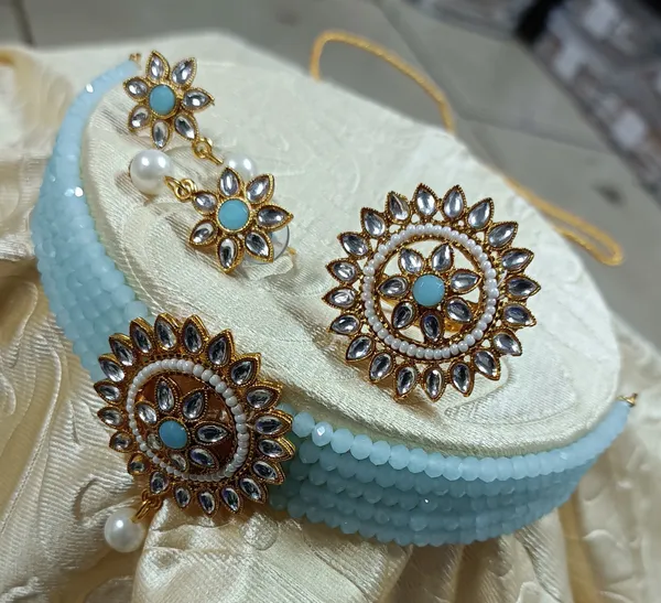 GOLD_PLATED_MULTISTRING_SKYBLUE_NECKLACE_WITH_FINGER_RING