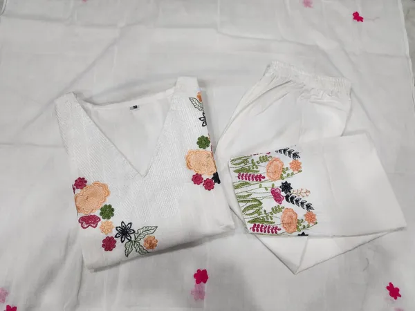 Beautiful_Embroidered_Cotton_Dobby_Kurti_and_Pant_Paired_with_Mulmul_Embroidered_Dupatta