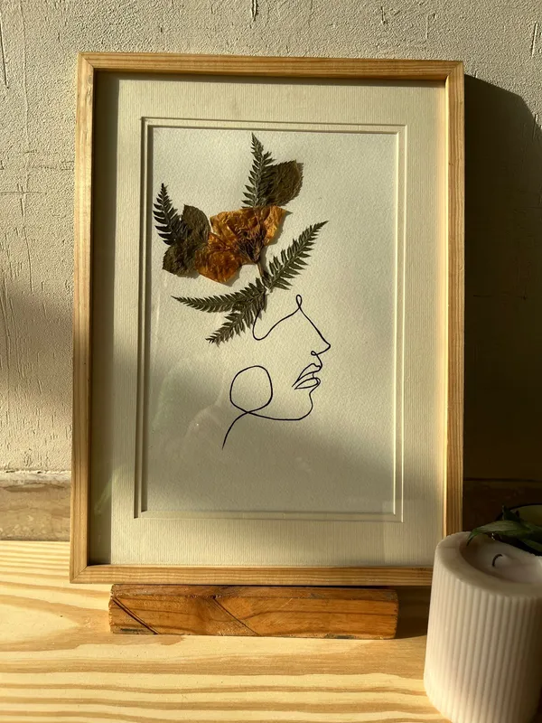 Lokal_Livin_Botanical_Face_Line_Drawing_Frame_With_Dried_Petals_And_Leaves_Minimalist_Wall_Decor_|_Light_Wood_|_Pine_|_11_X_15_Inch