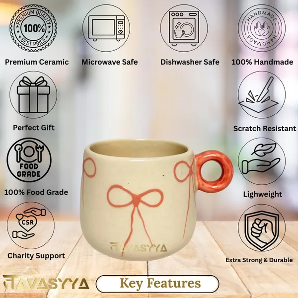 Light_Beige_Handmade_Ceramic_Coffee_&_Tea_Cup_With_Bow_Design_Coffee_Mug_With_Round_Handle