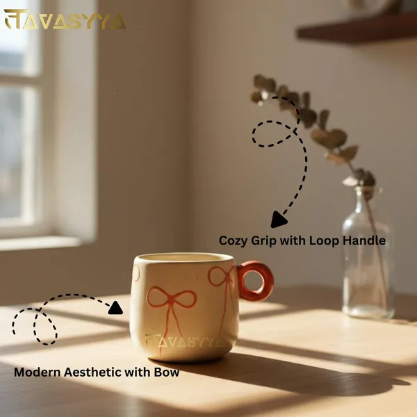 Light_Beige_Handmade_Ceramic_Coffee_&_Tea_Cup_With_Bow_Design_Coffee_Mug_With_Round_Handle