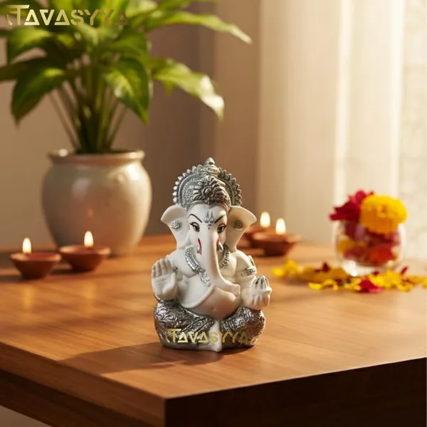 Tavasyya_Ganesha_Idol_for_Car_Dashboard,_Home_Temple_&_Office_Desk,_Small_Ganpati_Murti,_Gajanana_Idol_for_Pooja_Room,_Housewarming_Gift_&_Study_Table_Decor_3.5_Inch_Resin_(White_&_Silver_Plated)
