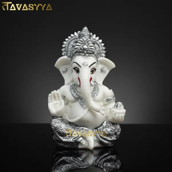 Tavasyya_Ganesha_Idol_for_Car_Dashboard,_Home_Temple_&_Office_Desk,_Small_Ganpati_Murti,_Gajanana_Idol_for_Pooja_Room,_Housewarming_Gift_&_Study_Table_Decor_3.5_Inch_Resin_(White_&_Silver_Plated)