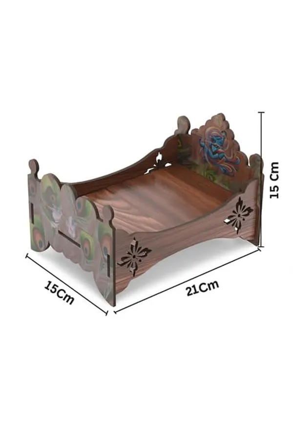 Brown_Wooden_Laddu_Gopal_Palna_Bed_With_Krishna_Bansuri_Design_&_Peacock_Feather_Print_–_Decorative_Jhula_For_Janmashtami_&_Mandir_Decor