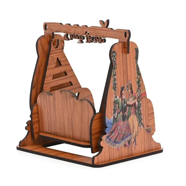 Brown_Wooden_Radha_Krishna_Jhula_With_'Jai_Shree_Krishna'_Carving_–_Decorative_Swing_Palna_For_Laddu_Gopal_|_Mandir_Decor_For_Janmashtami_&_Pooja_Room