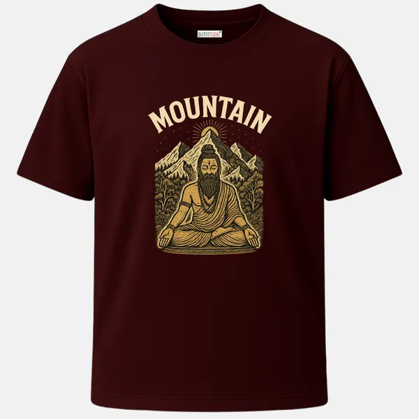 _Regular_Unisex_Maroon_Graphics_T-Shirt,_Meditating_sage_in_front_of_himalaya_style_mountains_golden_tones_mountain_text_|_TRAVEL_MODE