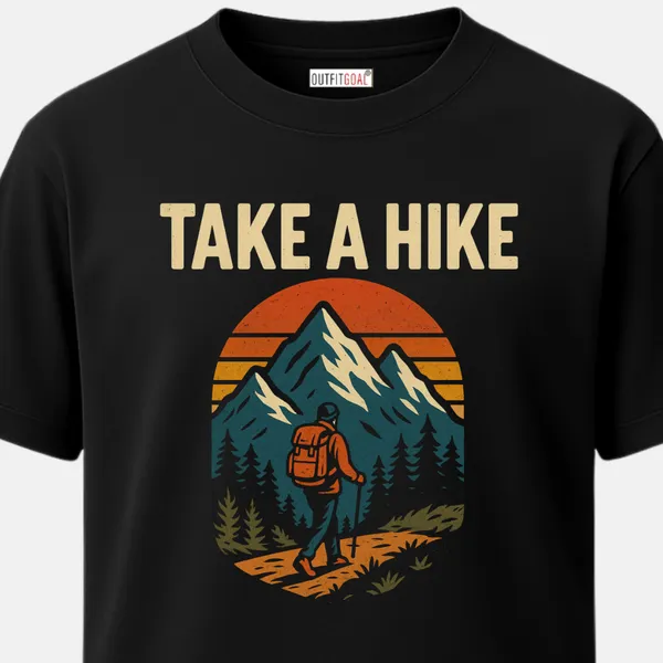 _Regular_Unisex_Navy_Graphics_T-Shirt,_Hiker_with_backpack_walking_toward_snowy_peaks_text_take_a_hike_|_TRAVEL_MODE