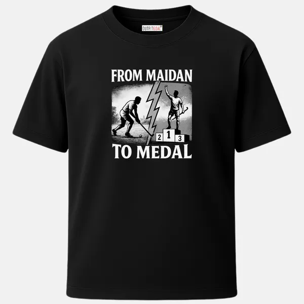 _Regular_Unisex_Black_Graphics_T-Shirt,_Two_hockey_players_one_playing_on_field_one_celebrating_on_podium_separated_by_lightning_bolt_gritty_black_and_white_style_with_bold_text_from_maidan_to_medal_|_SPORTS_MODE