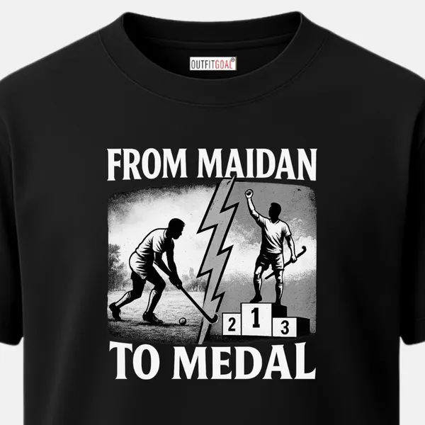 _Regular_Unisex_Black_Graphics_T-Shirt,_Two_hockey_players_one_playing_on_field_one_celebrating_on_podium_separated_by_lightning_bolt_gritty_black_and_white_style_with_bold_text_from_maidan_to_medal_|_SPORTS_MODE