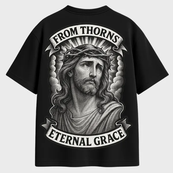 _Oversize_Unisex_Black_Graphics_T-Shirt,_Monochrome_portrait_of_Christ_with_halo_and_crown_of_thorns,_From_Thorns_Eternal_Grace_typography;_classic_grayscale_artistry._|_GRAPHICS_MODE