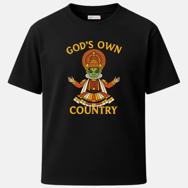 _Regular_Unisex_Black_Graphics_T-Shirt,_Full_Kathakali_dancer_figure_with_extended_arms_and_layered_costume_under_curved_text__GOD’S_OWN_COUNTRY,_bright_folk_art_style_celebrating_Kerala_culture._|_TRAVEL_MODE