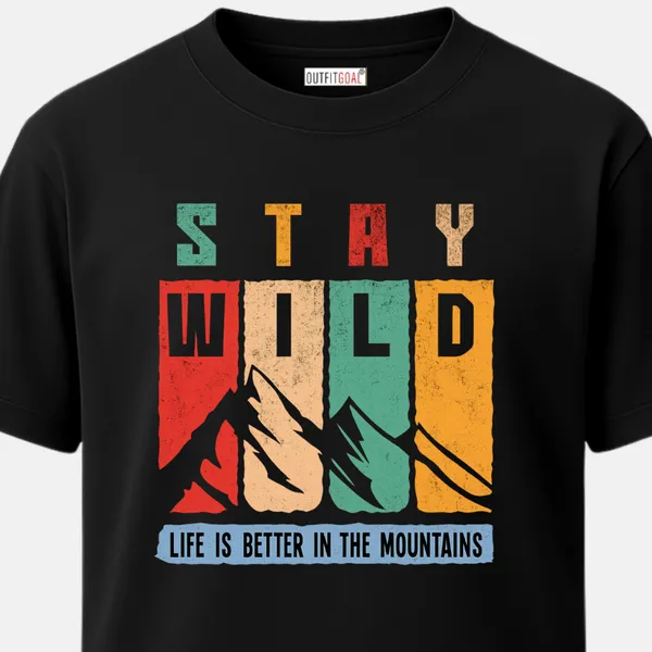 _Regular_Unisex_Black_Graphics_T-Shirt,_Block_type_art_stay_wild_mountain_silhouettes_colorful_retro_panels_|_TRAVEL_MODE