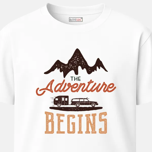 _Regular_Unisex_White_Graphics_T-Shirt,_Retro_style_car_caravan_type_art_the_adventure_begins_mountains_backdrop_|_TRAVEL_MODE
