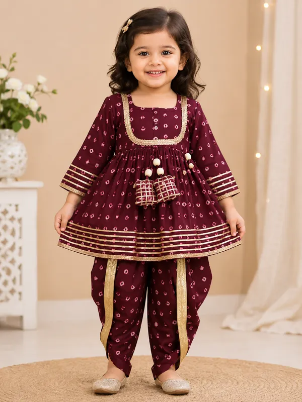 Girls_Maroon_Printed_Kurta_Dress_with_Dhoti_Pants_&_Gold_Border_–_Festive_Ethnic_Set