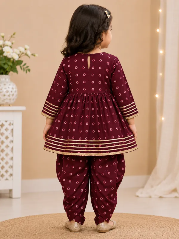 Girls_Maroon_Printed_Kurta_Dress_with_Dhoti_Pants_&_Gold_Border_–_Festive_Ethnic_Set