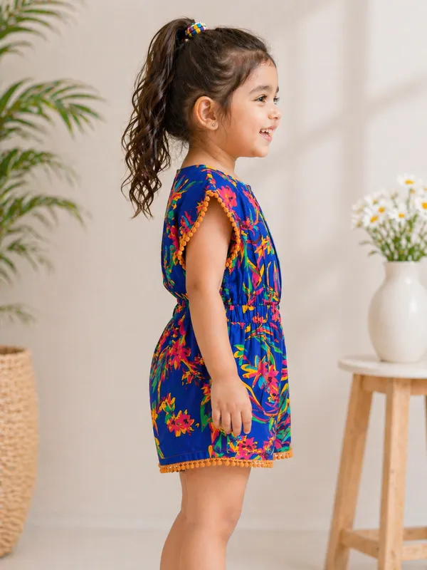 Girls_Printed_Cotton_Playsuit_Blue_Floral_With_Pom-Pom_Trim