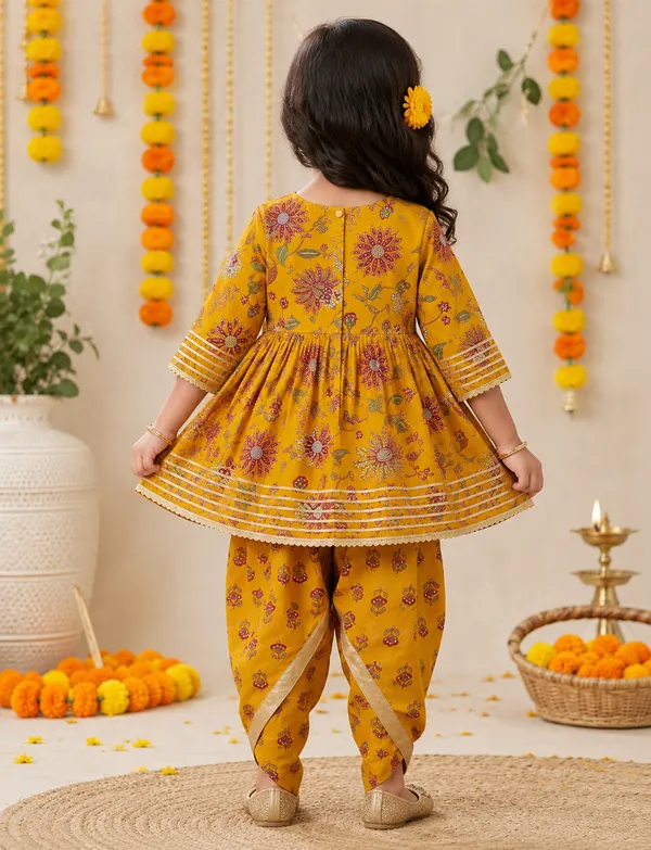 Girls_Mustard_Floral_Printed_Kurta_Dhoti_Set_With_Tassel_Detail