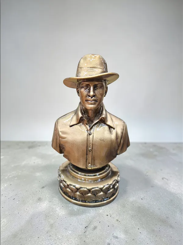 Shaheed_Bhagat_Singh_Bust_Statue_with_Hat_–_Antique_Golden_Finish_Poly_Resin_Idol_for_Home_Decor,_Office_Desk_&_Gift_DA-_116