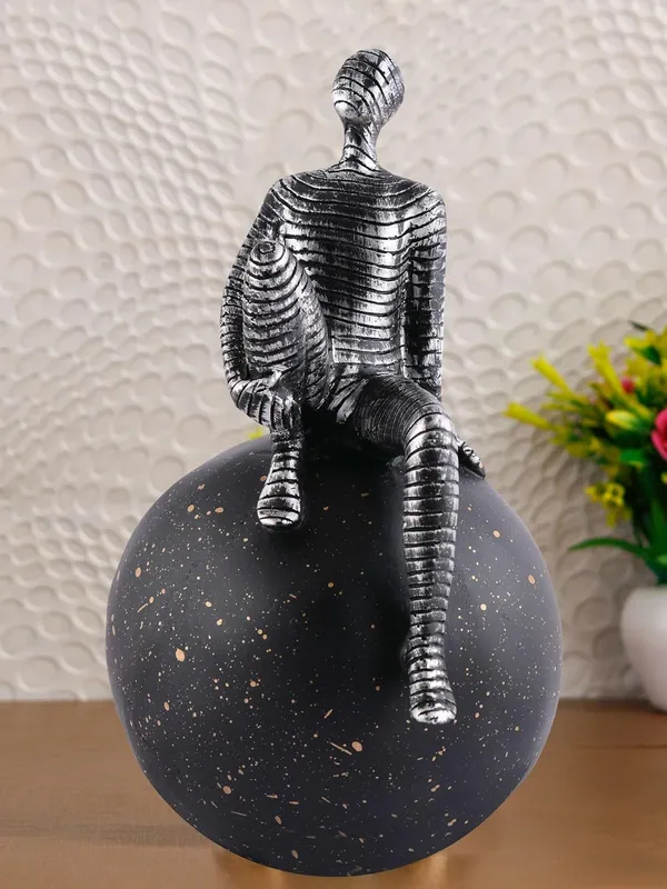 Multicolour_Men_Sitting_On_Ball_Showpiece_For_Home_Decor_Showpiece,_Atlas_Sculpture_For_Office_Table_Decor