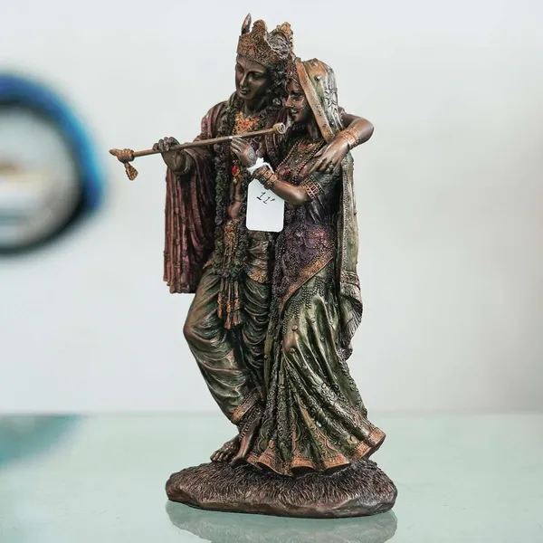 A_Beautiful_and_Intricate_Bronze_Statue_Depicting_Radha_and_Krishna,_Two_Central_Deities_in_Hinduism