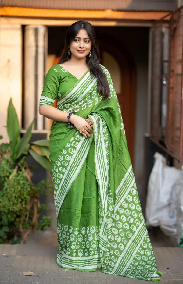 Green_Block_Printed_Cotton_Saree_With_Floral_Motifs_And_Tassel_Border_For_Women